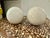 Pair of handmade Italian made white marble decorative spheres, can be used as bookends.