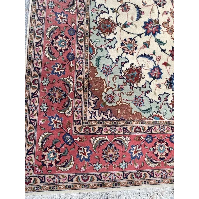 Wonderful late 20th century fine Tabriz rug with a beautiful floral and central medallion design and beautiful colors,...