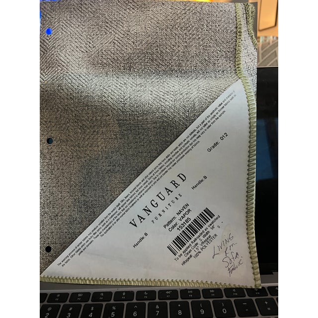 Light Grey Jules sofa, custom fabric. Tapered Lawson arm with pleat. Welt around base. Knife-edge down back cushions,...