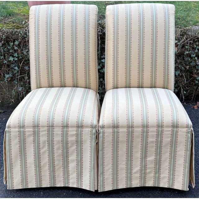 Beautiful pair of parsons chairs by Ethan Allen. Features a versatile pale yellow striped upholstery with light green and...