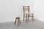 This rustic oak tripod stool from France, dating to around 1900, embodies the quiet authenticity of rural craftsmanship....