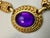 Trifari 80s panther link necklace with center purple lucite cabachon. 17.5” from end to end.