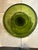 Large vintage bowl on pedestal by Indiana Glass company. Thick green glass has scallop edges with tear drop shaped detail.