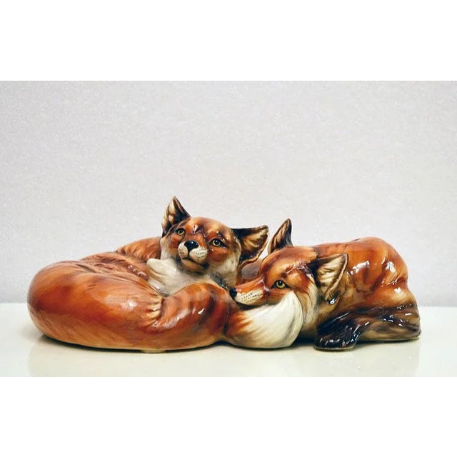 - A ceramic figurine - Depicting a pair of foxes i - Hand-made and hand-painted with airbrush - Produced by Ceramiche...