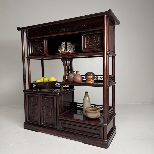 This traditional Japanese kazaridana from the 1930s elegantly combines storage and display in one harmonious piece of...