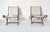 A refined pair of folding armchairs designed by gio ponti, made in 1958 by fratelli reguitti and published in "novità,"...