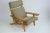 Pair of wide arm lounge chairs by Hans Wegner for GETAMA.