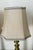 Great pair of brass table lamps with custom tan silk shades with double trim.