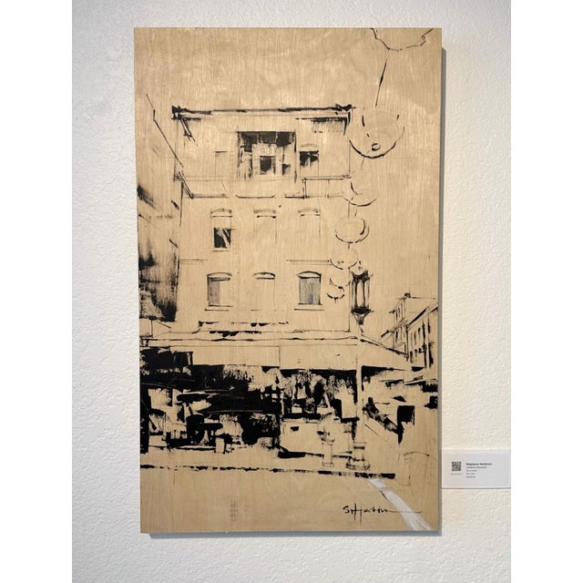 Lanterns (Acoustic) presents a serene urban scene, capturing the interplay of architecture and light. The oil on wood...
