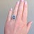 Art Deco Pompadour ring (circa 1930), masterfully crafted in solid platinum. At its heart lies a magnificent 4-carat...