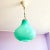 This vintage pendant light in pear shape comes in a rare turquoise opaline glass. It is equipped with a new 1980s metal...
