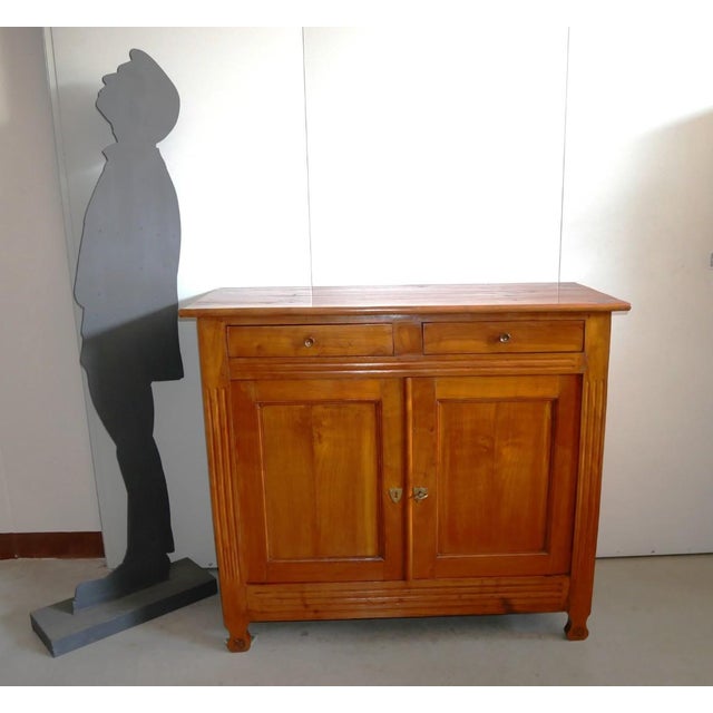 Antique solid cherry sideboard, mid-19th century Restored solid cherry sideboard. Period: first half of the 19th century....