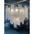 Contemporary alabastro “listelli ” murano glass chandelier. three levels of transparent and rectangular venied white...