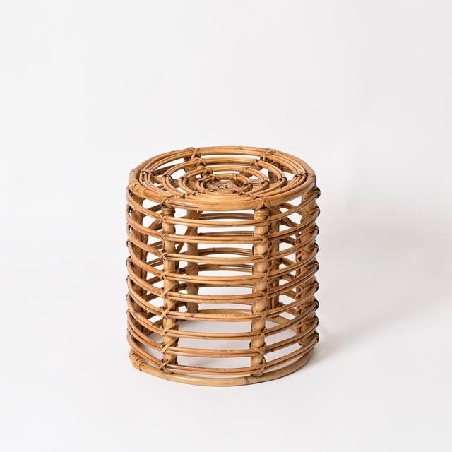 Gorgeous Mid-Century organic pouf or side table fully made in curved rattan and hand-woven wicker. This stylish French...