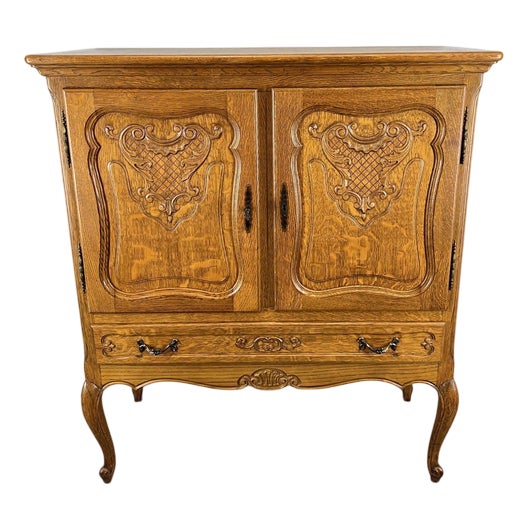 Vintage French Louis XVI Style Oak Cabinet with Carved Panels For Sale