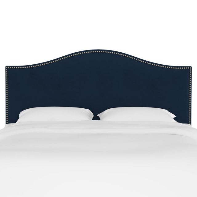 Give your interior a lift with the Headboard. Featuring the delicate curves of a classic camelback design, with subtle...