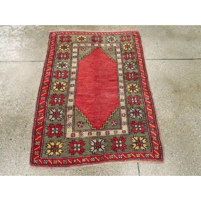 An antique Turkish Oushak throw rug handmade during the Early 20th century. Measures: 3' 0" x 4' 1"