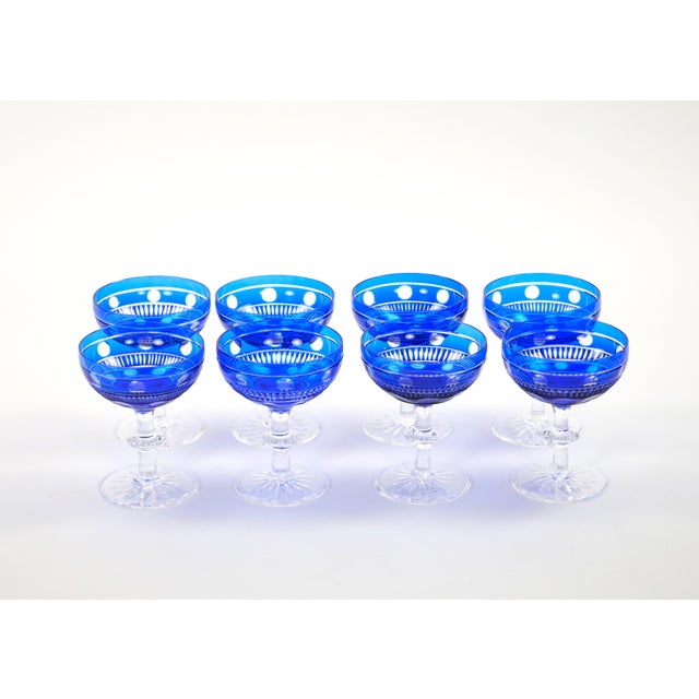 An elegant service of eight mid-century modern Val Saint Lambert crystal champagne coupe glassware service, made in...