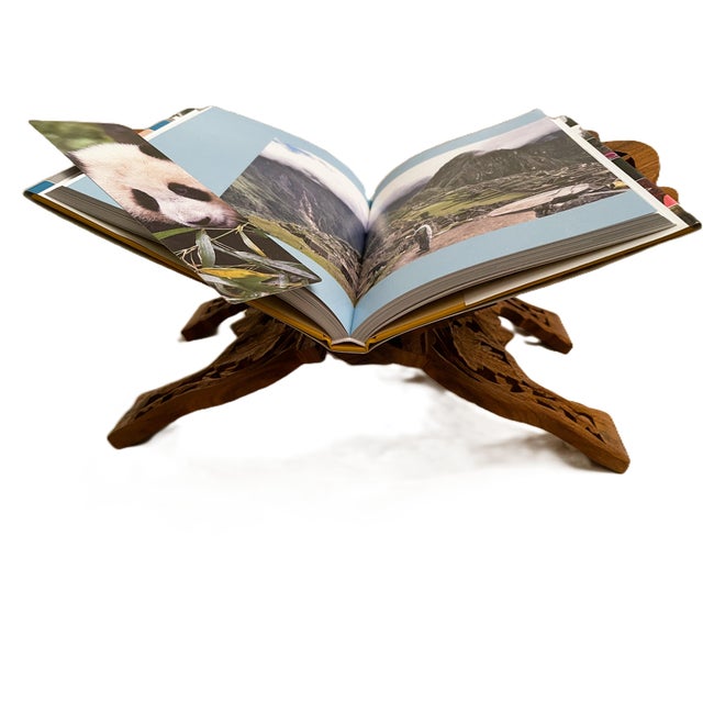 Celebrate refined craftsmanship and everyday elegance with this hand-carved Indian sandalwood book reading stand, a...