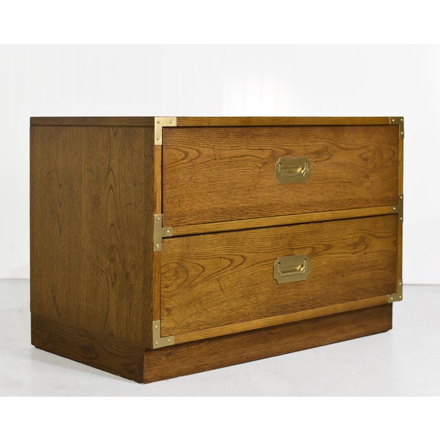 This handsome pair of solid wood 1970s Campaign Nightstand is an amazing addition to your decor. It is the perfect accent...