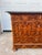 A handsome 19th-century French Louis Philippe commode, featuring richly figured burl walnut veneer, four spacious drawers,...
