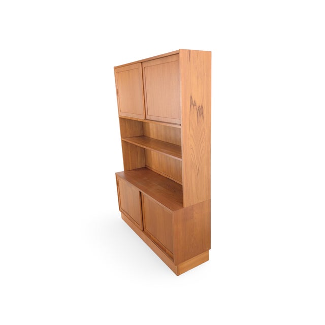 Beautiful vintage designer cabinet from the renowned Danish manufacturer Hundevad for sale. The cabinet consists of two...