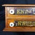 Showcasing a rich golden oak finish, this miniature spool cabinet boasts two drawers fitted with porcelain knobs and...