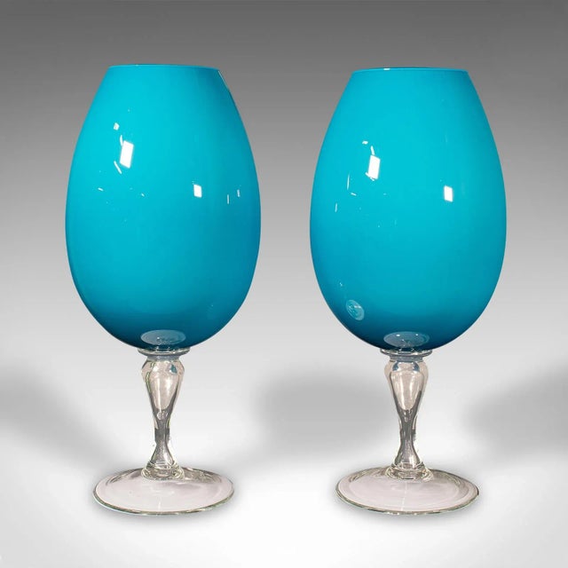 This is a giant pair of vintage wine glasses. An English, decorative glass planter or vase, dating to the late 20th...