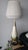 A beautiful Mid-Century table lamp in gold, green, and pearl tones. You can stare and discover many things in the...