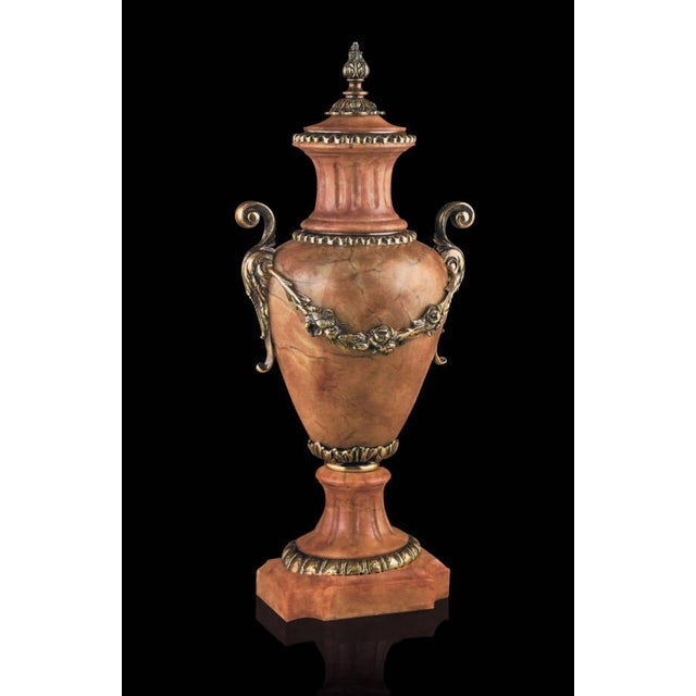 Hand-carved alabaster urn in a warm brandy hue, adorned with finely detailed antique bronze castings. The graceful,...
