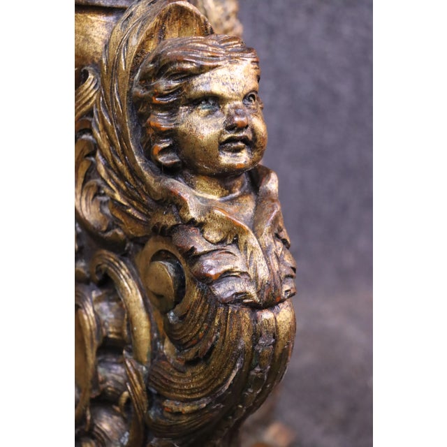 Giltwood Italian carved pedestal with cherub accents
