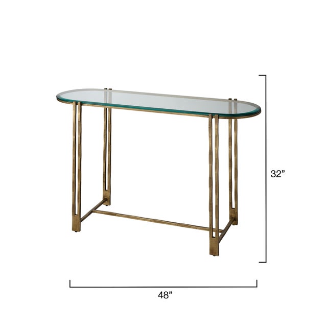With its slim iron frame and beveled glass top, this console table embodies modern refinement and quiet sophistication....
