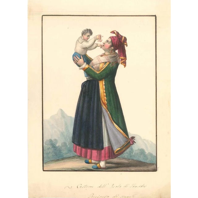 Costume dell'Isola di Procida is an enchanting watercolour on ivory colored paper made by the artist Michela De Vito in...