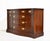 Stately and beautifully proportioned, this mid-century Federal style curve front buffet by Bassett Furniture is a...