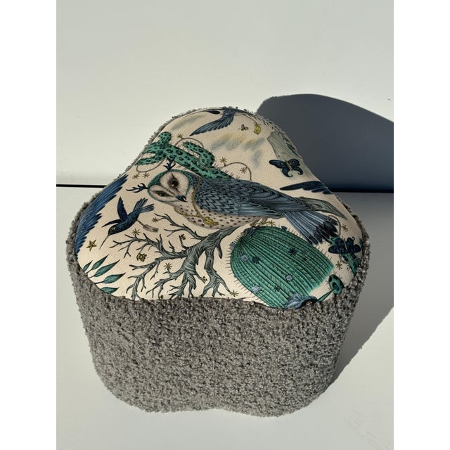 Triangular shaped boucle stool with whimsical owl print design / motif.