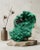A sculptural natural Stalactitic Velvet Malachite specimen selected for its vivid emerald-green color, rounded botryoidal...