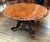 Impressive Victorian oval centre table with a richly figured burr walnut veneered top Beautiful swirling grain patterns...