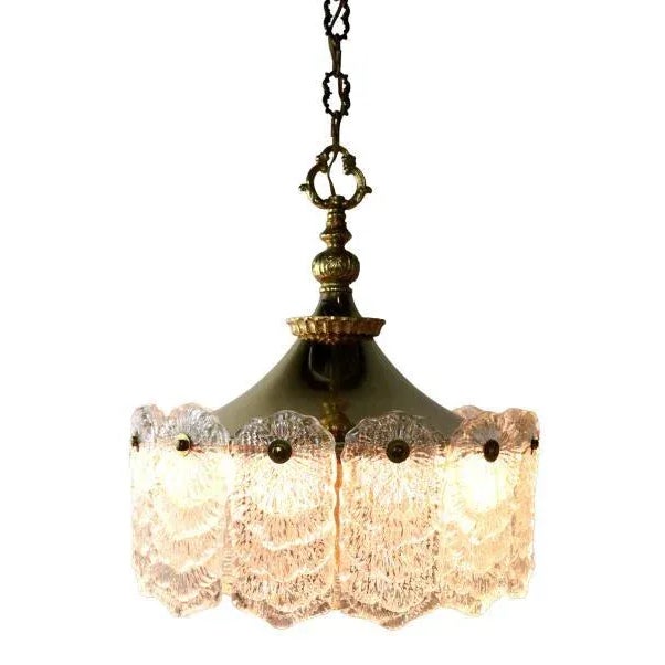 Very heavy and beautifully executed lamp, made of brass plated metal in combination with "frosted ice" side panels made of...