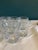 This vintage finds set of 12 clear glass juice tumblers by Anchor Hocking features a timeless tapered design with a sturdy...