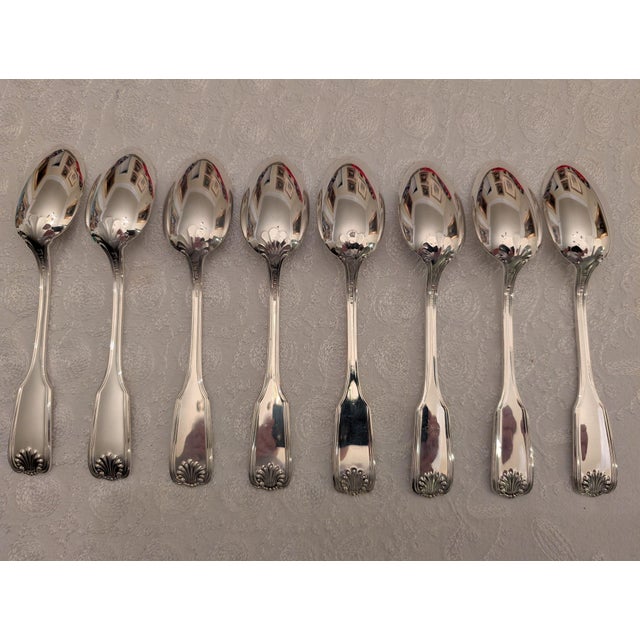 A lot of 8 sterling silver teaspoons by Towle Silversmiths in the "Benjamin Franklin" pattern, which depicts the forever-...