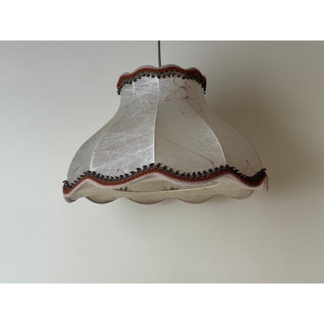 We are thrilled to introduce a one-of-a-kind Cocoon pendant lamp from the 1960s to 1970s. The design and extra-large...