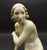 This marvelous seated nude female figurine is created in gorgeous Rosenthal of Germany porcelain in muted flesh-tone...