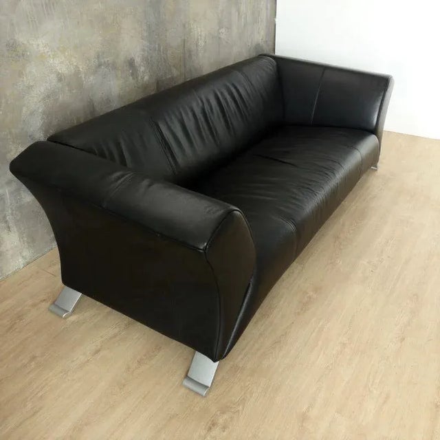 Black Leather 2-Seat Sofa by Rolf Benz, 2000s, in Very Good conditions. Designed from 2000 This piece has an attribution...