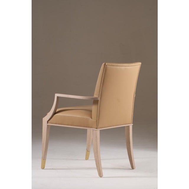 Oak wood Lightly brushed bleached oak finish Gold metal feet Leather seat and backrest