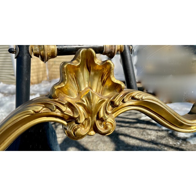 An elaborate, spectacular gilt gold mirror where the Rococo Era met the early reign of Louis XV. A French influence with...