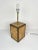 Table lamp with a particular base in cork and brass, made in Italy, 1970s. Up to 250V (Europe/UK Standard).The wiring of...