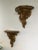 An exceptional pair of authentic 19th-century Italian Rococo wall shelves, masterfully hand-carved from solid wood and...