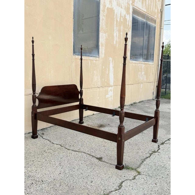 Vintage Georgian Federal Style Mahogany Four Poster Rice Carved Queen Size Bed Frame. Circa Late 20th Century....
