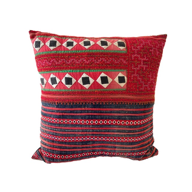 This exceptional vintage custom-made pillow, handcrafted by a hill tribe in Thailand, It features a black cotton backing...