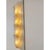 Contemporary luxury wall sconces in gold metal frame with leaves in murano glass and amber graniglia. a piece of hight...